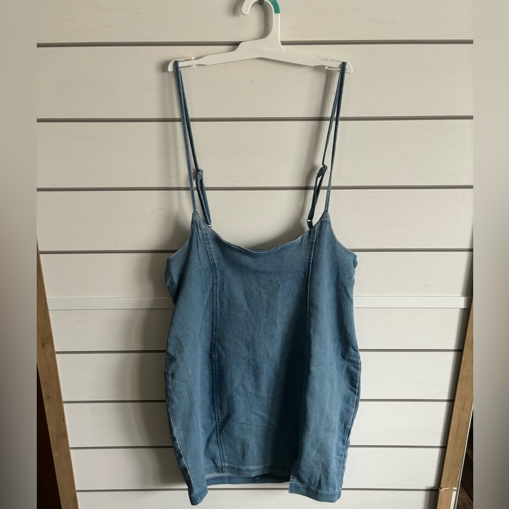 Light Blue Jean Dress. Zipper on the back. Open back with spaghetti straps.